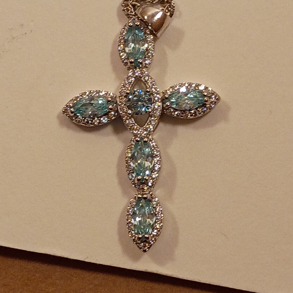Elegant Silver and Blue Gemstone Cross Necklace